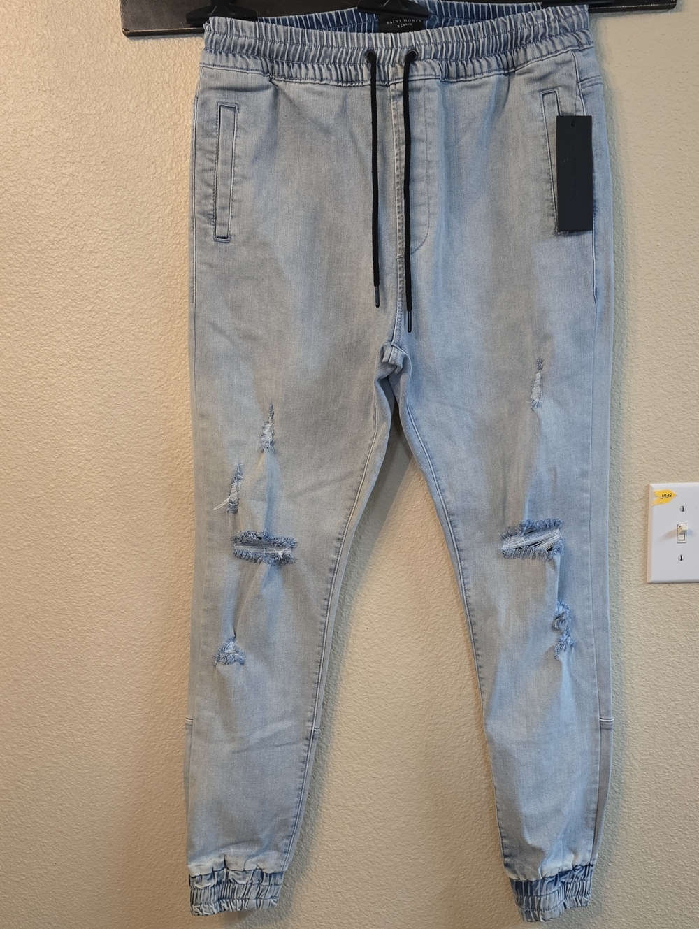 Relaxed Light Blue Distressed Jogger Jeans for Men